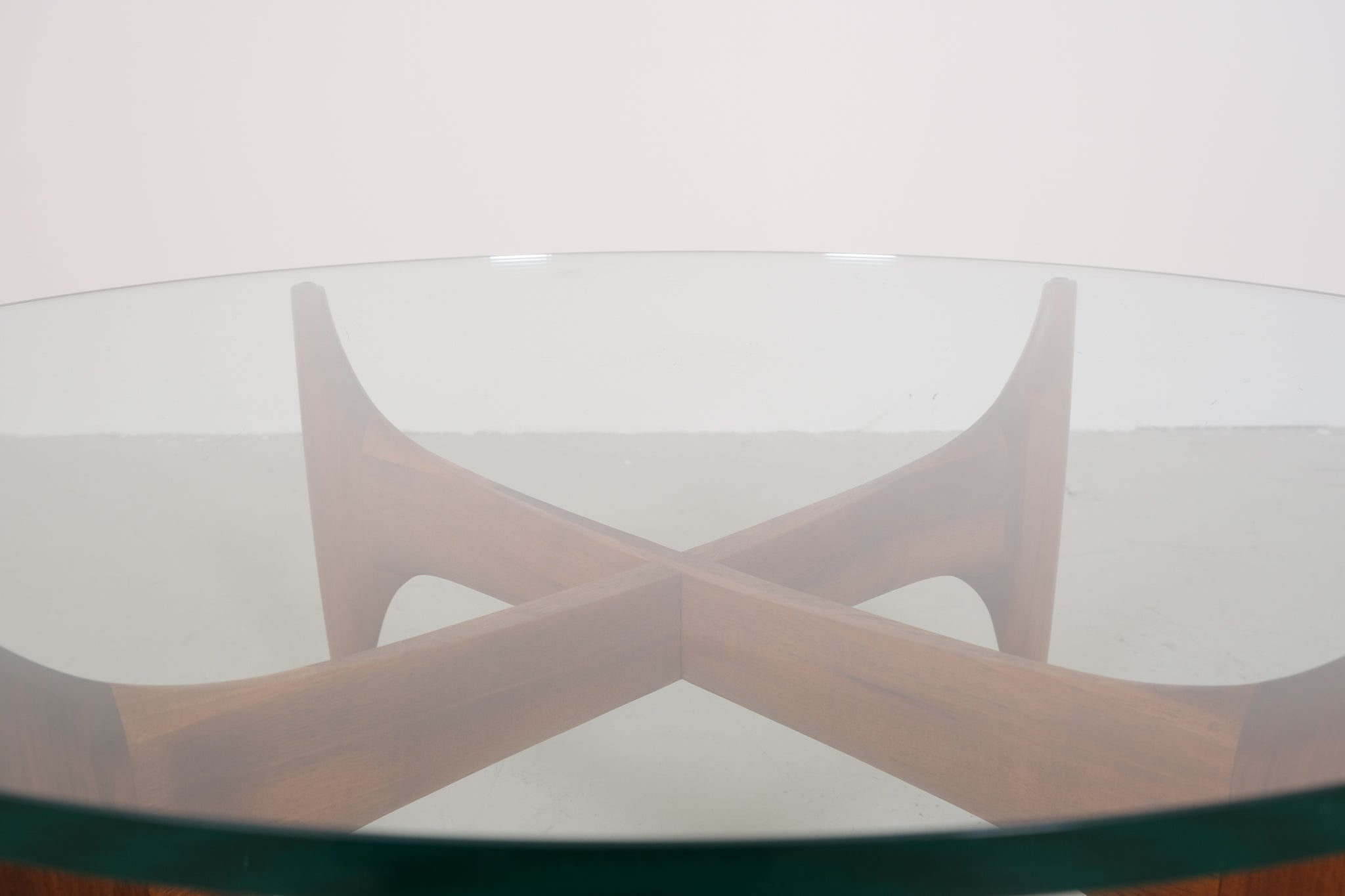 Vintage mid-century coffee table with teak base and glass top