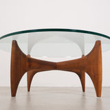 Vintage mid-century coffee table with teak base and glass top