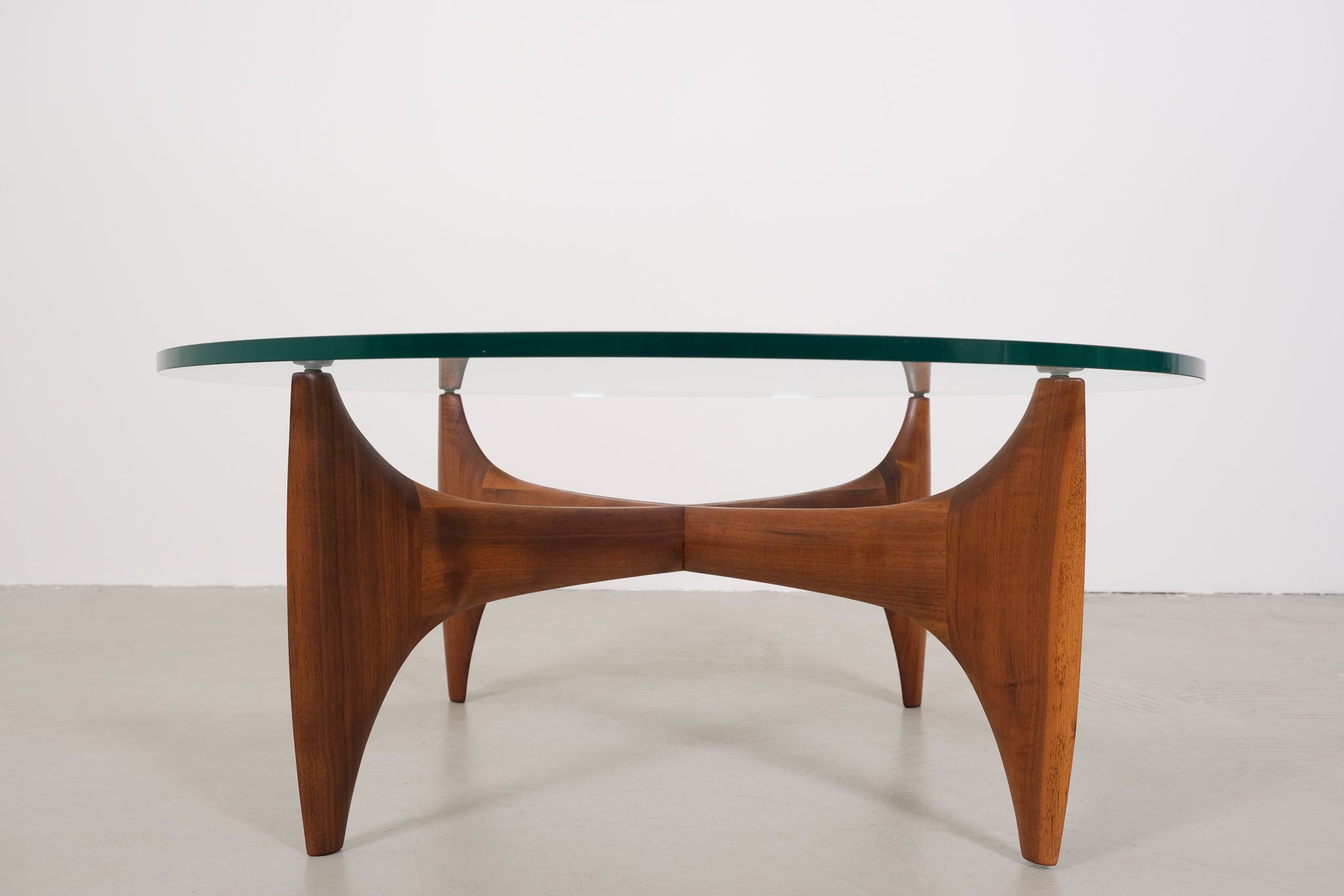 Vintage mid-century coffee table with teak base and glass top