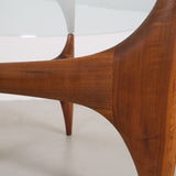 Vintage mid-century coffee table with teak base and glass top