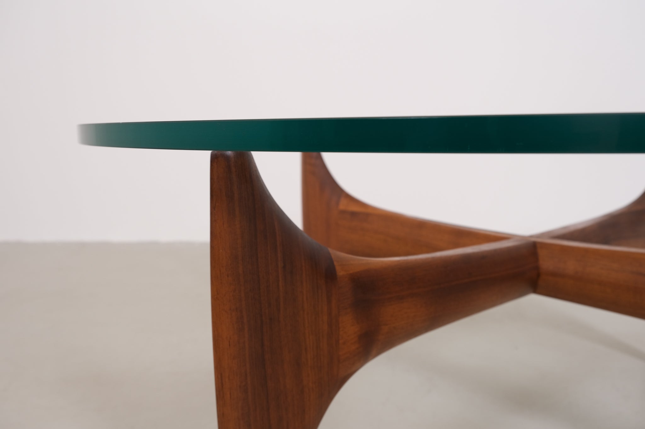 Vintage mid-century coffee table with teak base and glass top