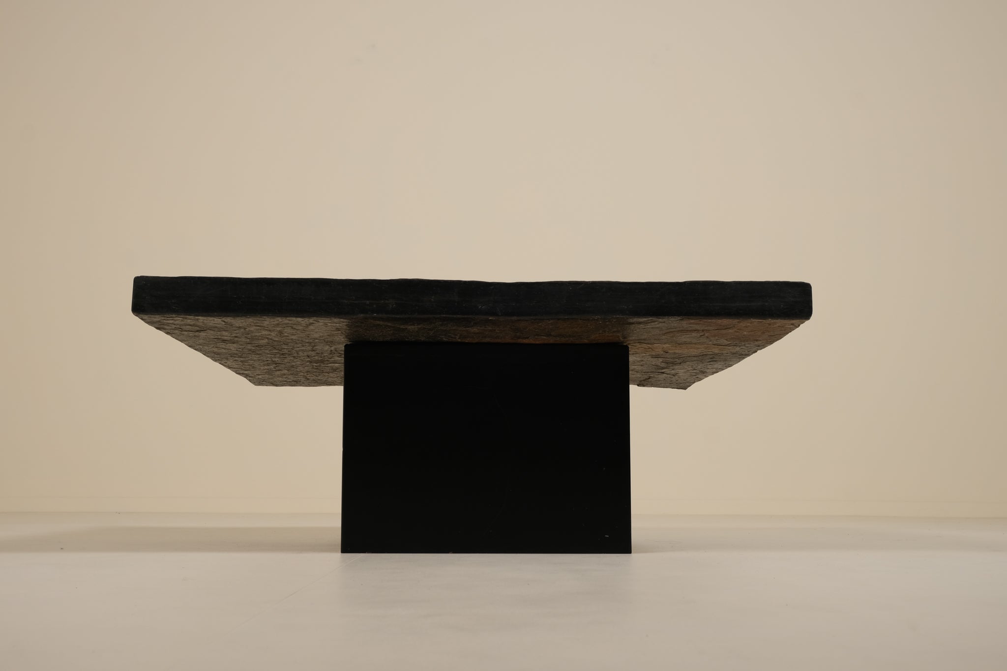 Slate coffee table on a beige background