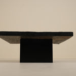 Slate coffee table on a beige background