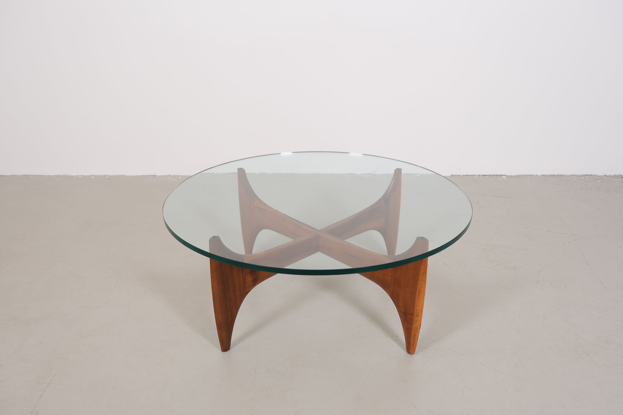 Vintage mid-century coffee table with teak base and glass top