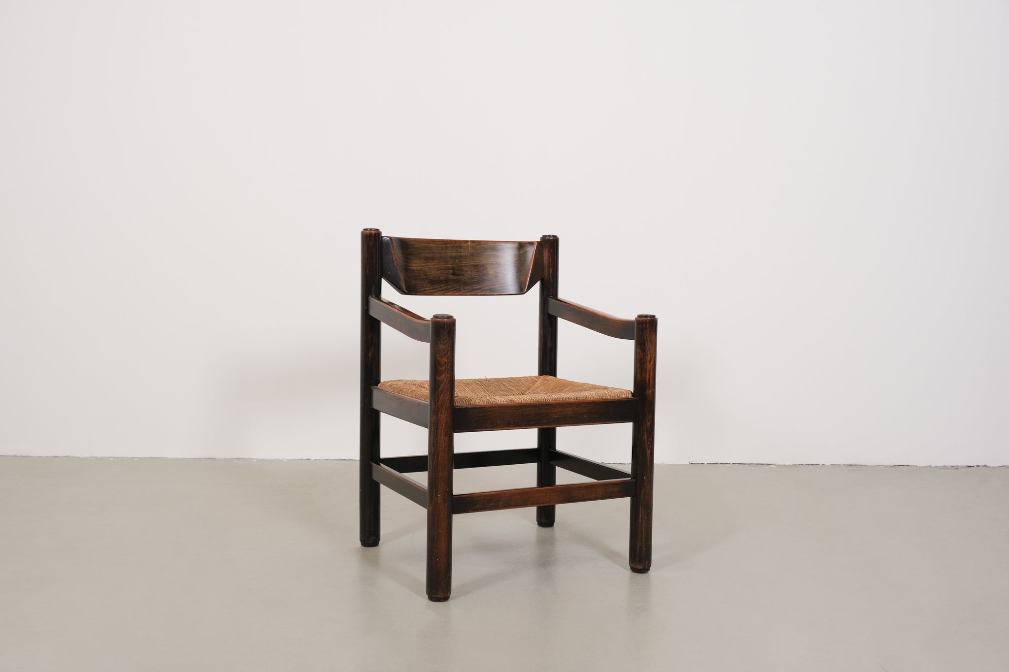 Vintage robust chair with wicker seat