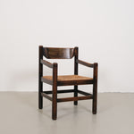 Vintage robust chair with wicker seat