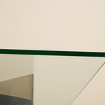 Glass table top on a beige background