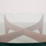 Vintage mid-century coffee table with teak base and glass top