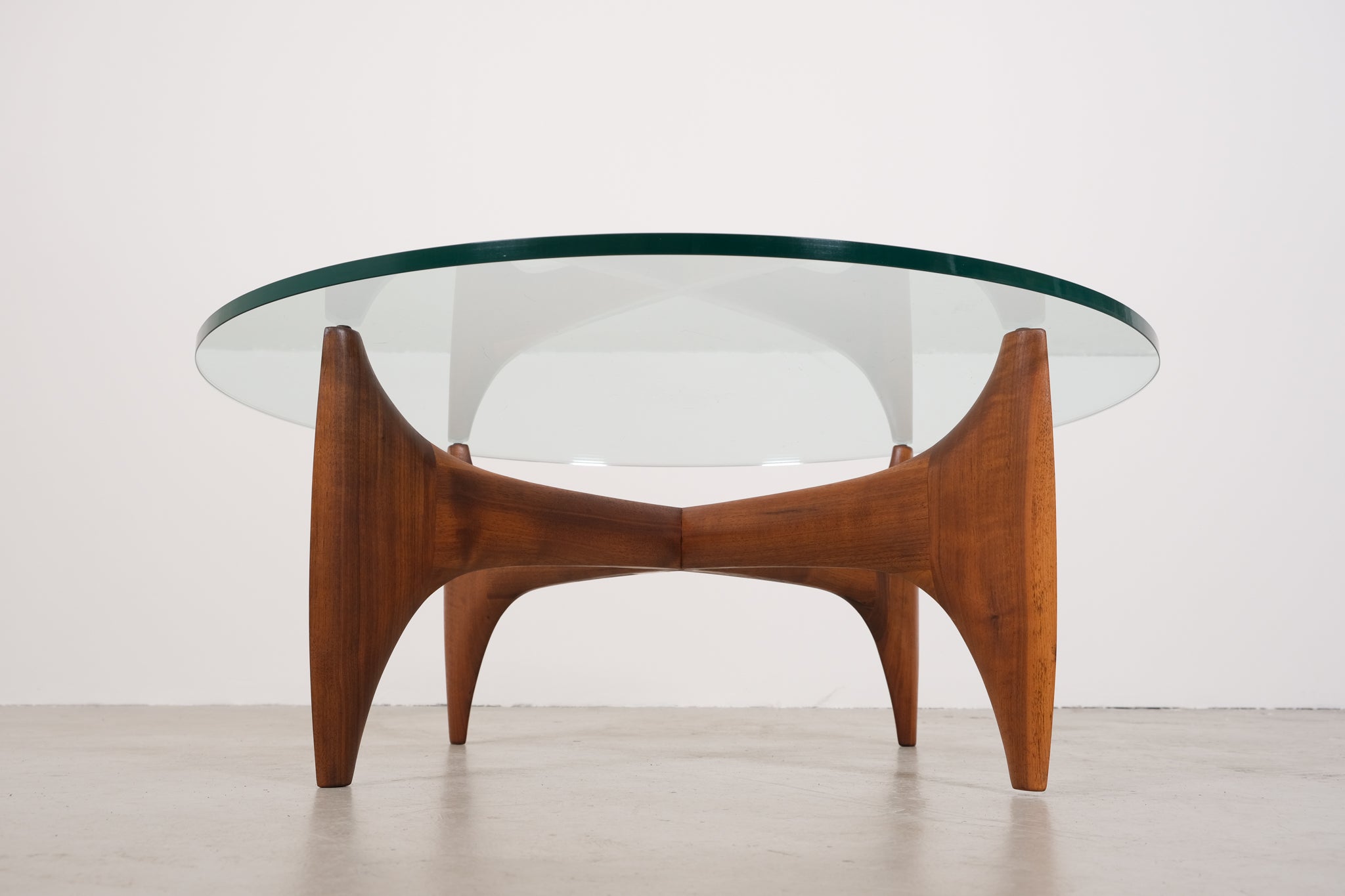 Vintage mid-century coffee table with teak base and glass top