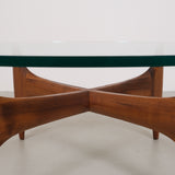 Vintage mid-century coffee table with teak base and glass top