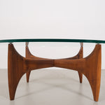 Vintage mid-century coffee table with teak base and glass top