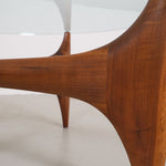Vintage mid-century coffee table with teak base and glass top