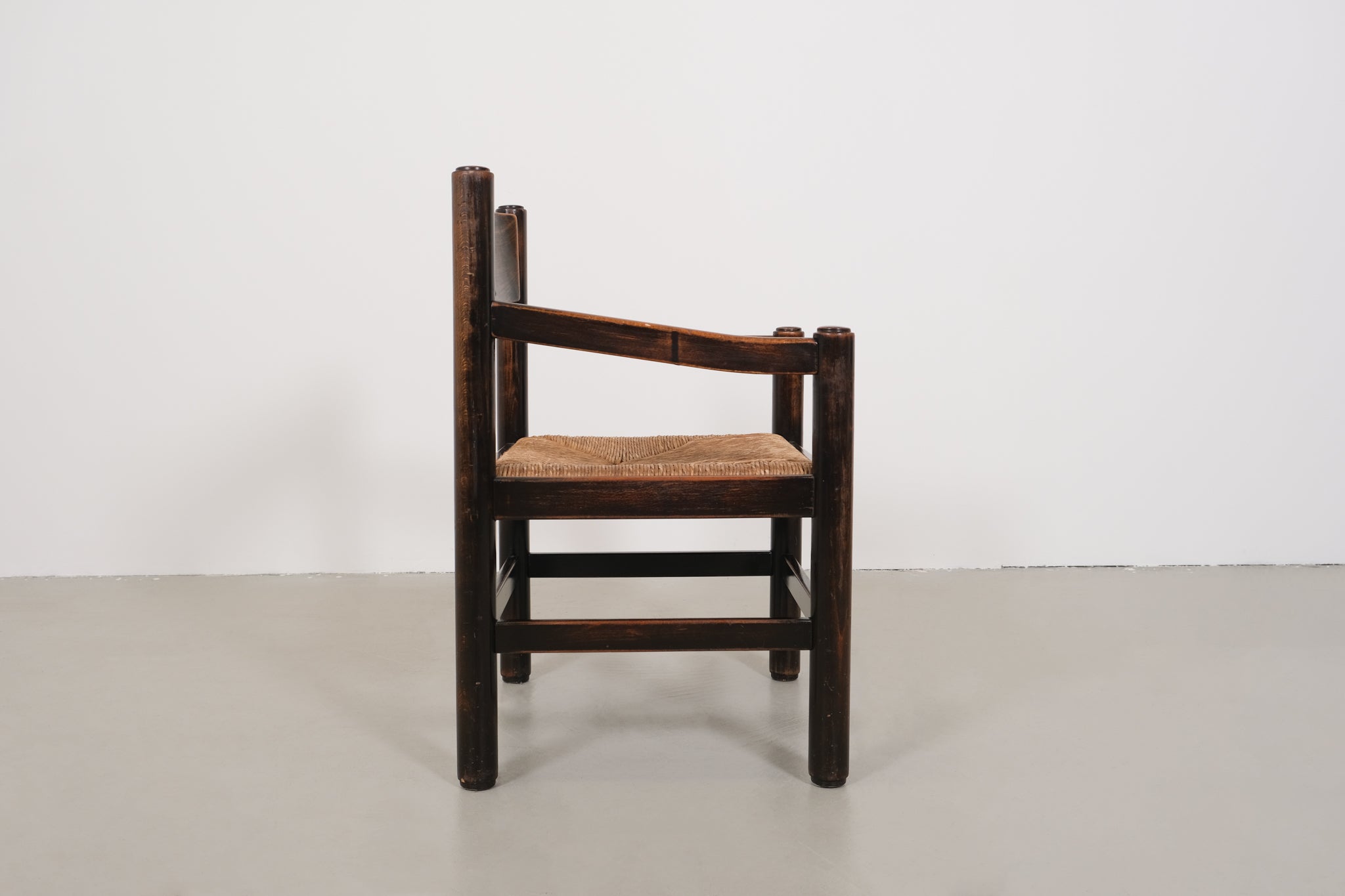 Vintage robust chair with wicker seat