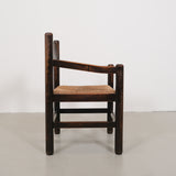 Vintage robust chair with wicker seat