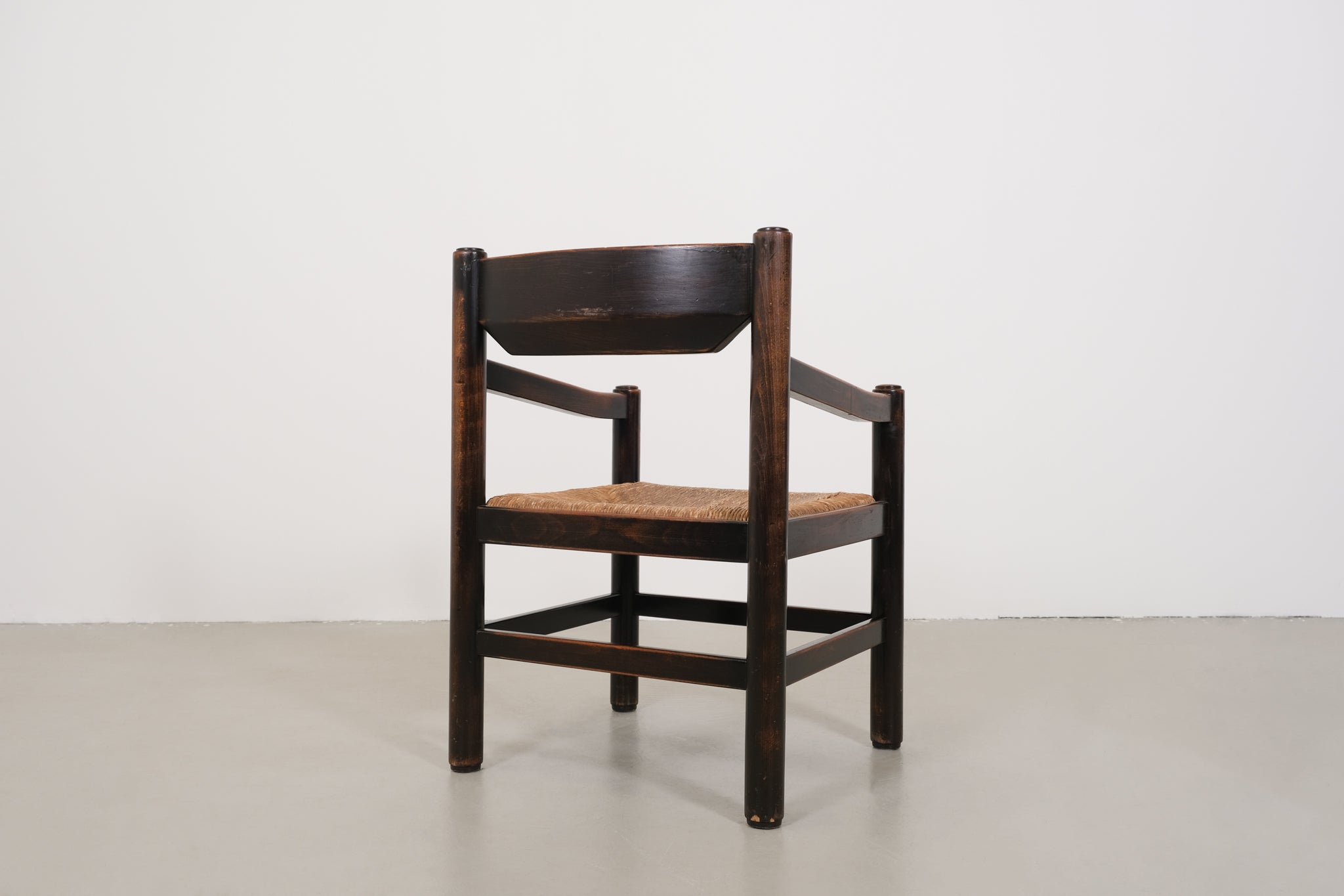 Vintage robust chair with wicker seat