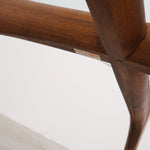 Vintage mid-century coffee table with teak base and glass top