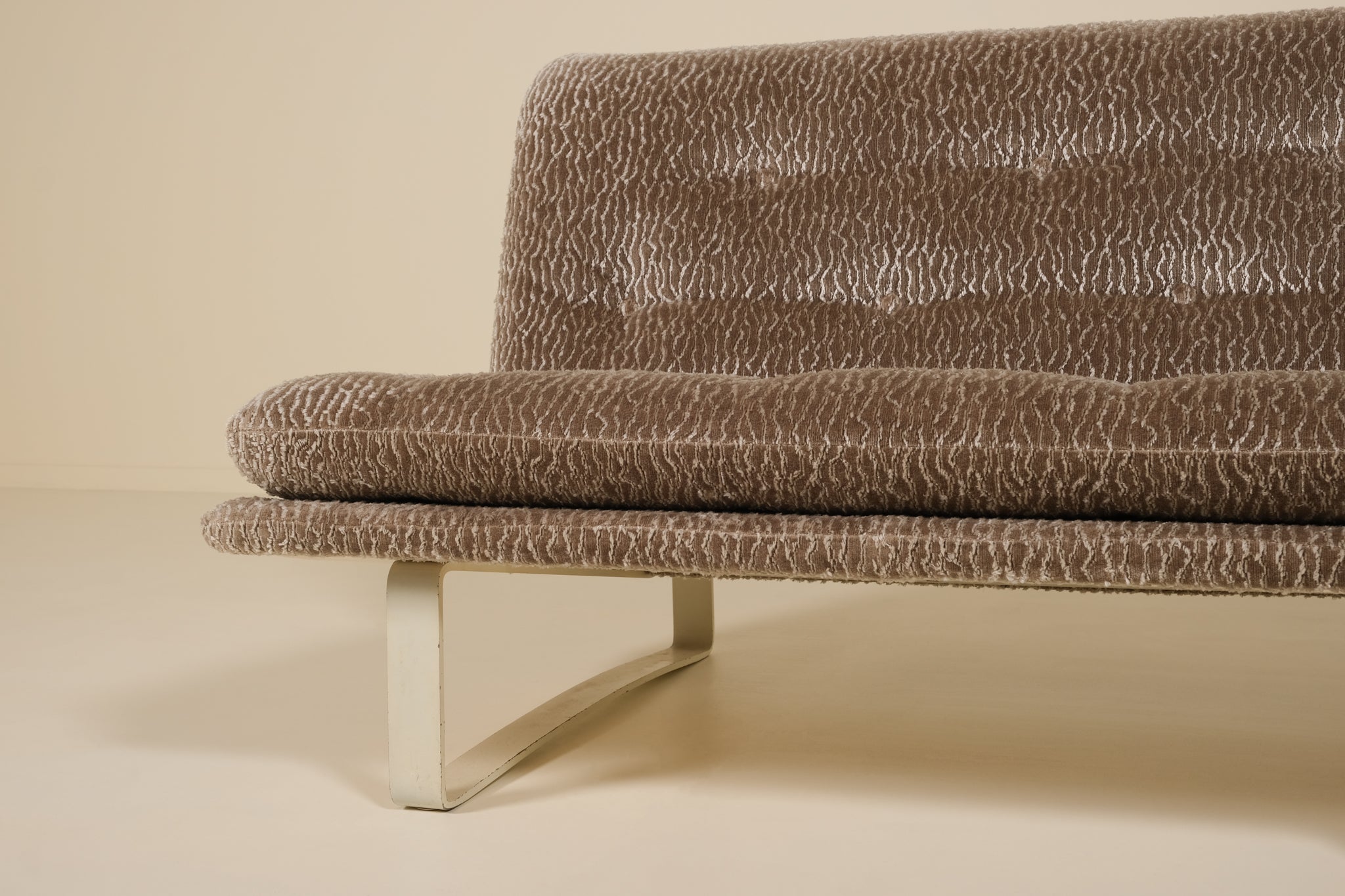 Brown textured sofa on a beige background