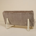Back of an artifort sofa on a beige background