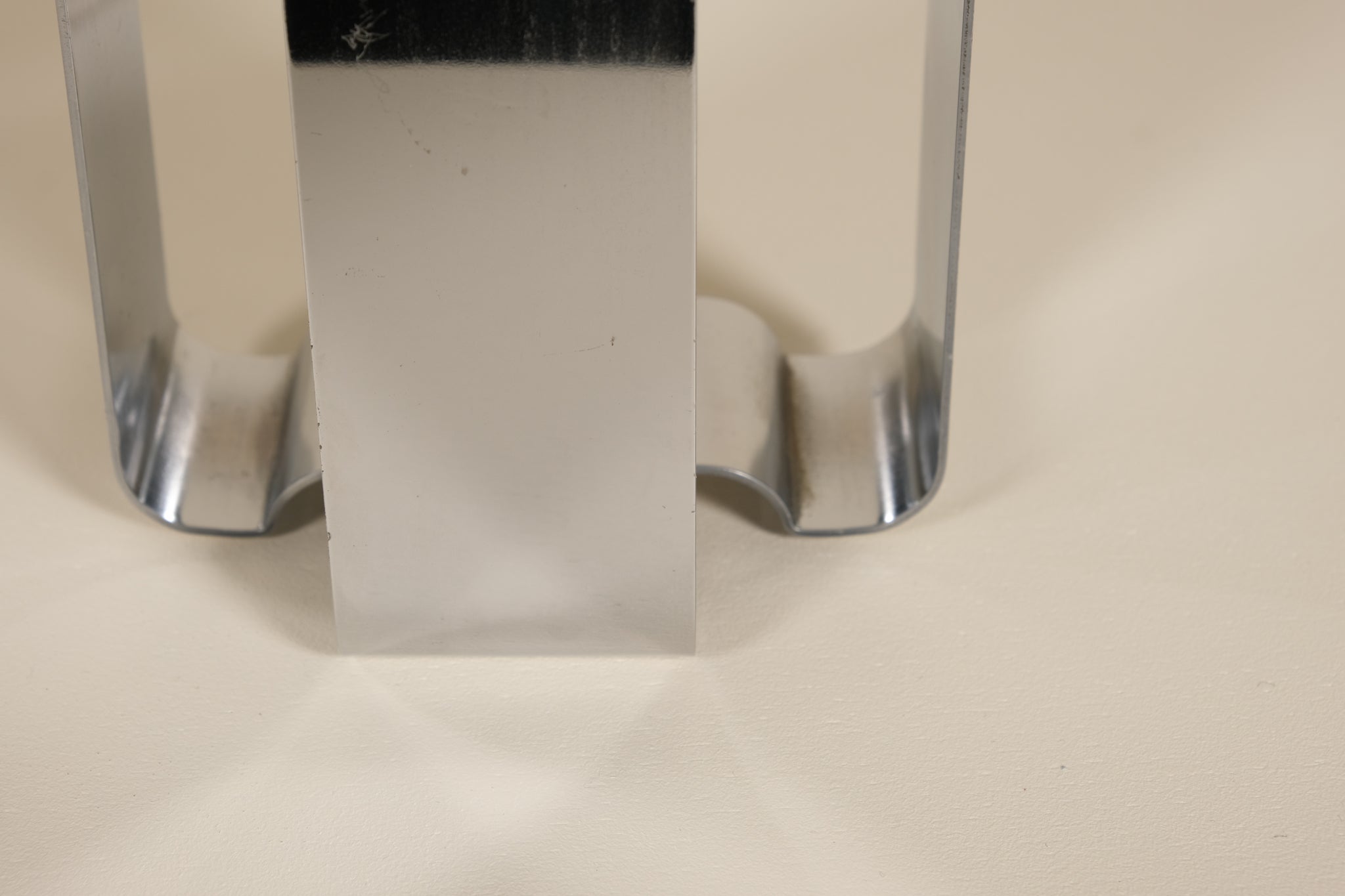 Close up of chrome base of Biglia lamp