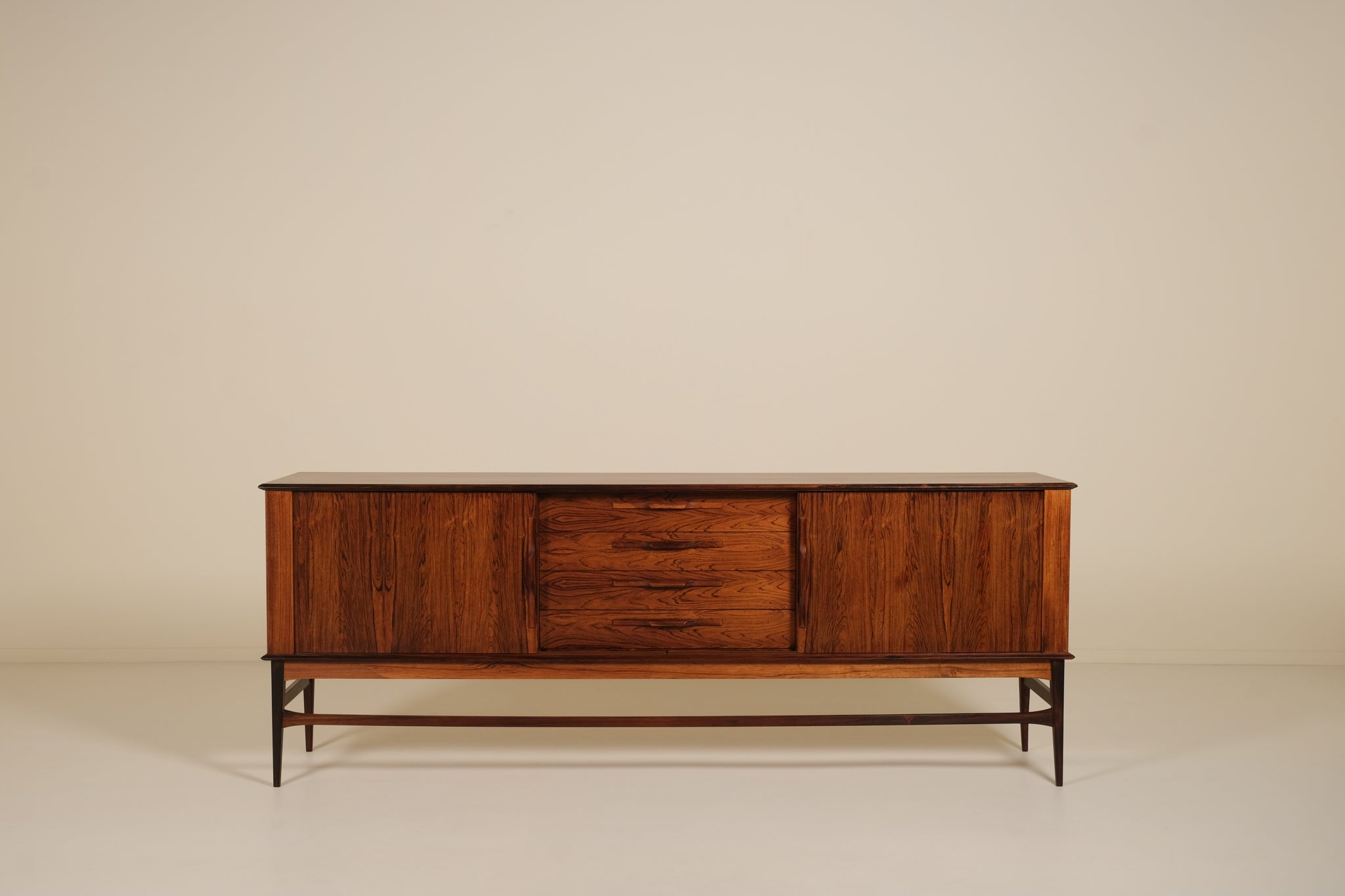 Wooden sideboard with a minimalist design on a beige background