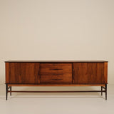 Wooden sideboard with a minimalist design on a beige background