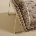 Brown textured artifort sofa on a beige background