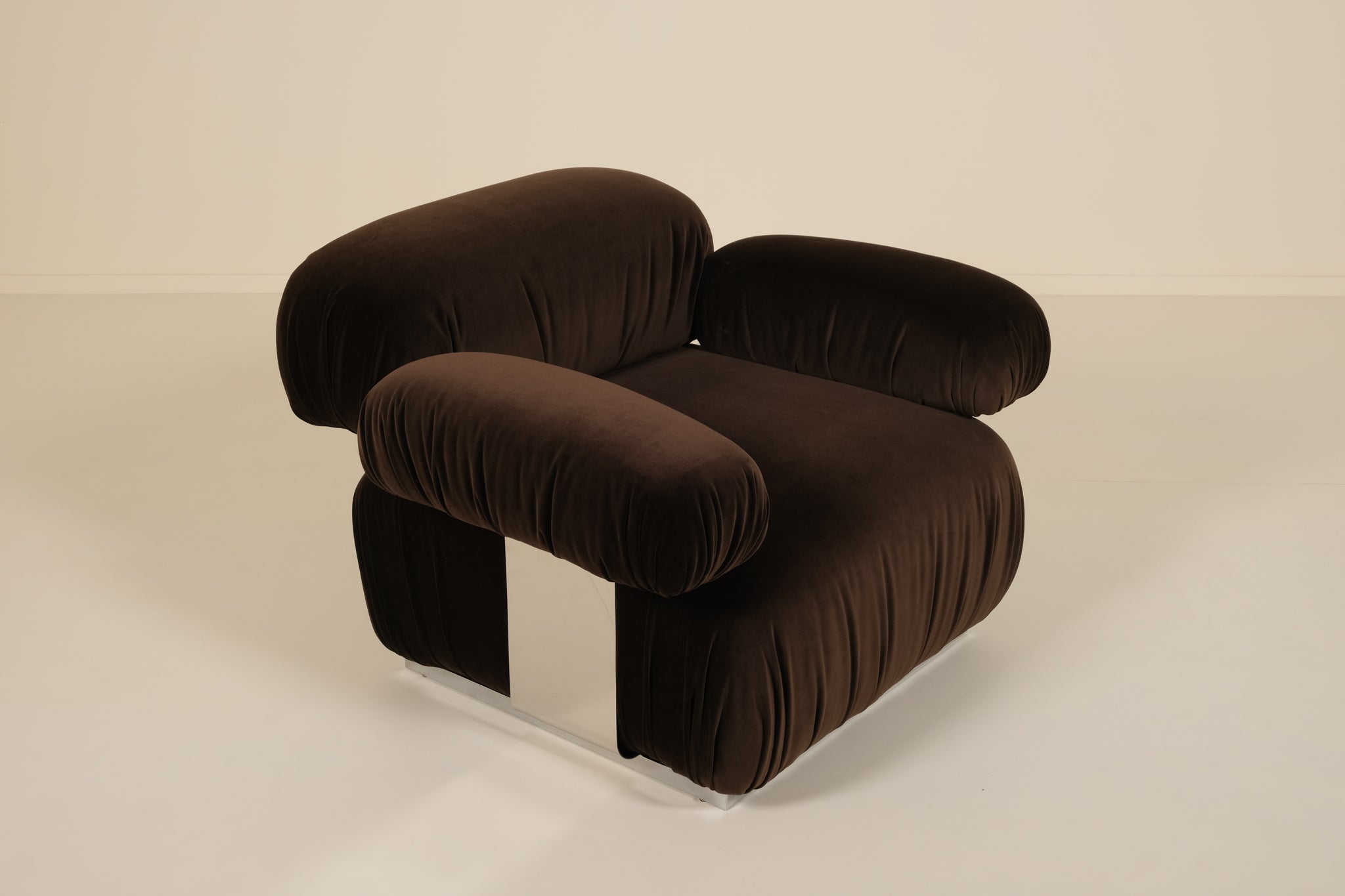 Brown armchair on a beige background