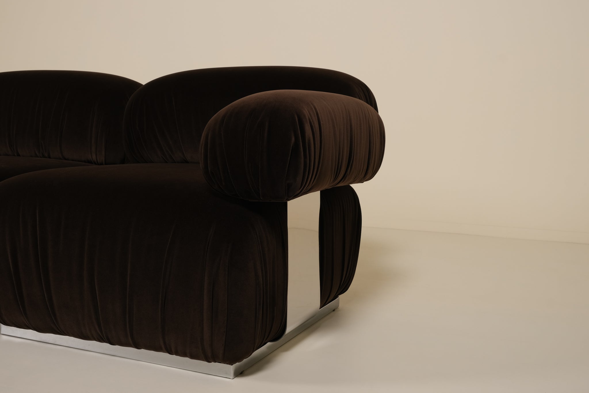 Brown sofa on a beige background