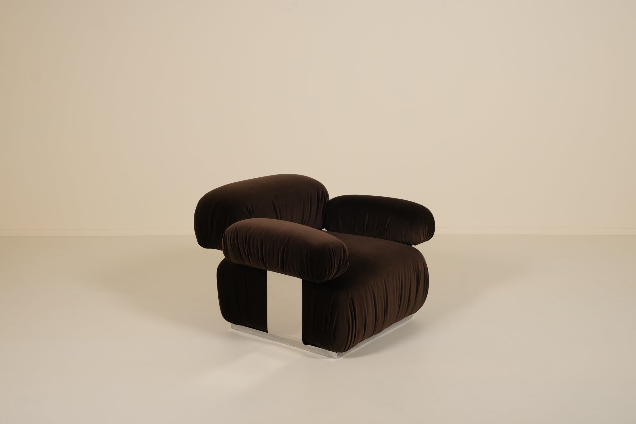 Brown lounge chair on a beige background