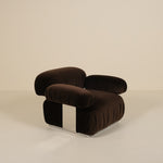 Brown lounge chair on a beige background