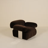 Brown lounge chair on a beige background
