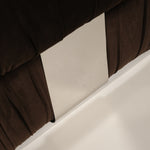 Close-up of a brown chair with a neutral background