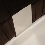 Close-up of a brown chair with a neutral background