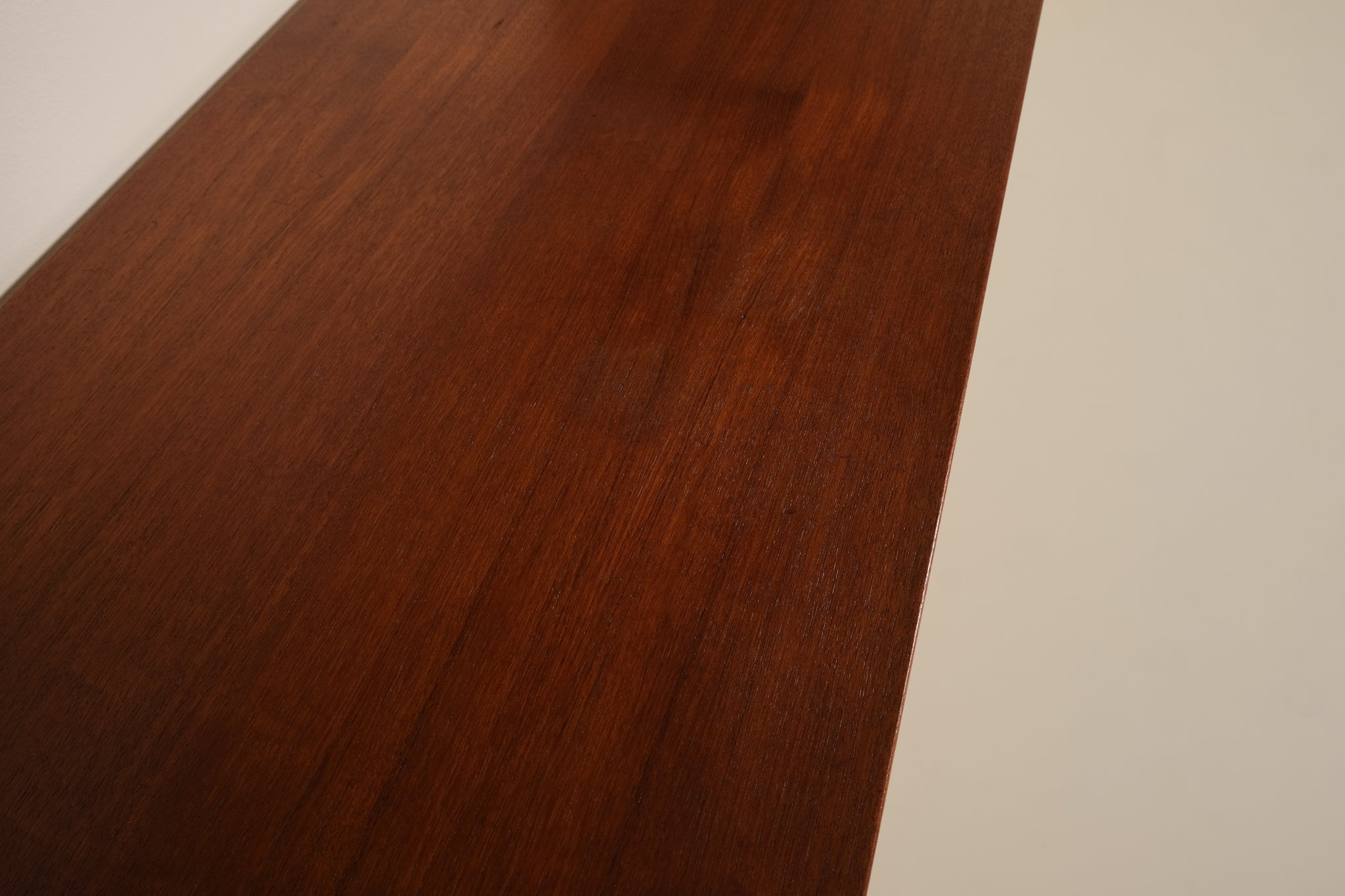 Close-up of a wooden surface with a plain background