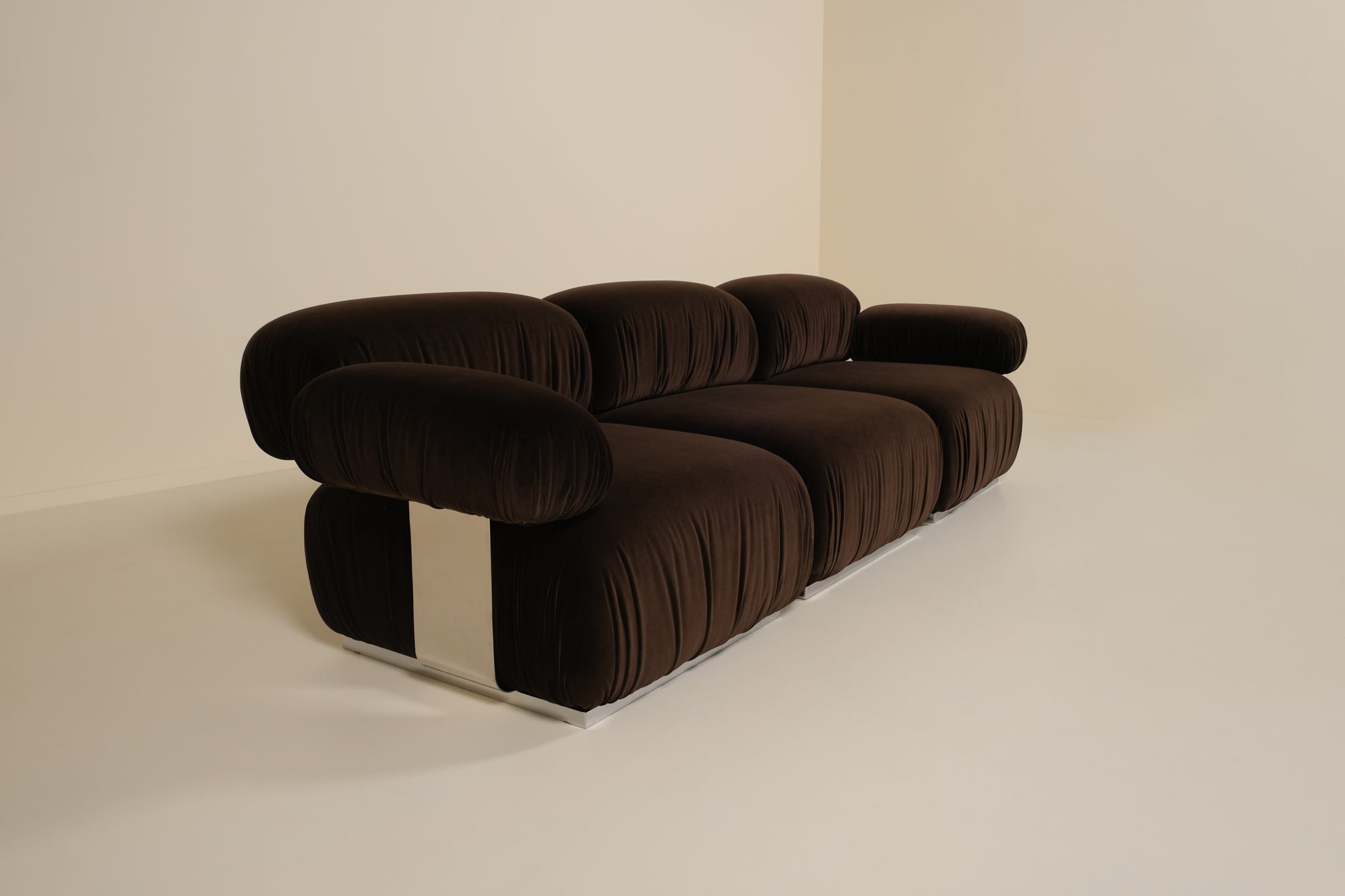 Brown sofa on a beige background