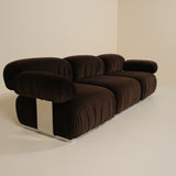 Brown sofa on a beige background