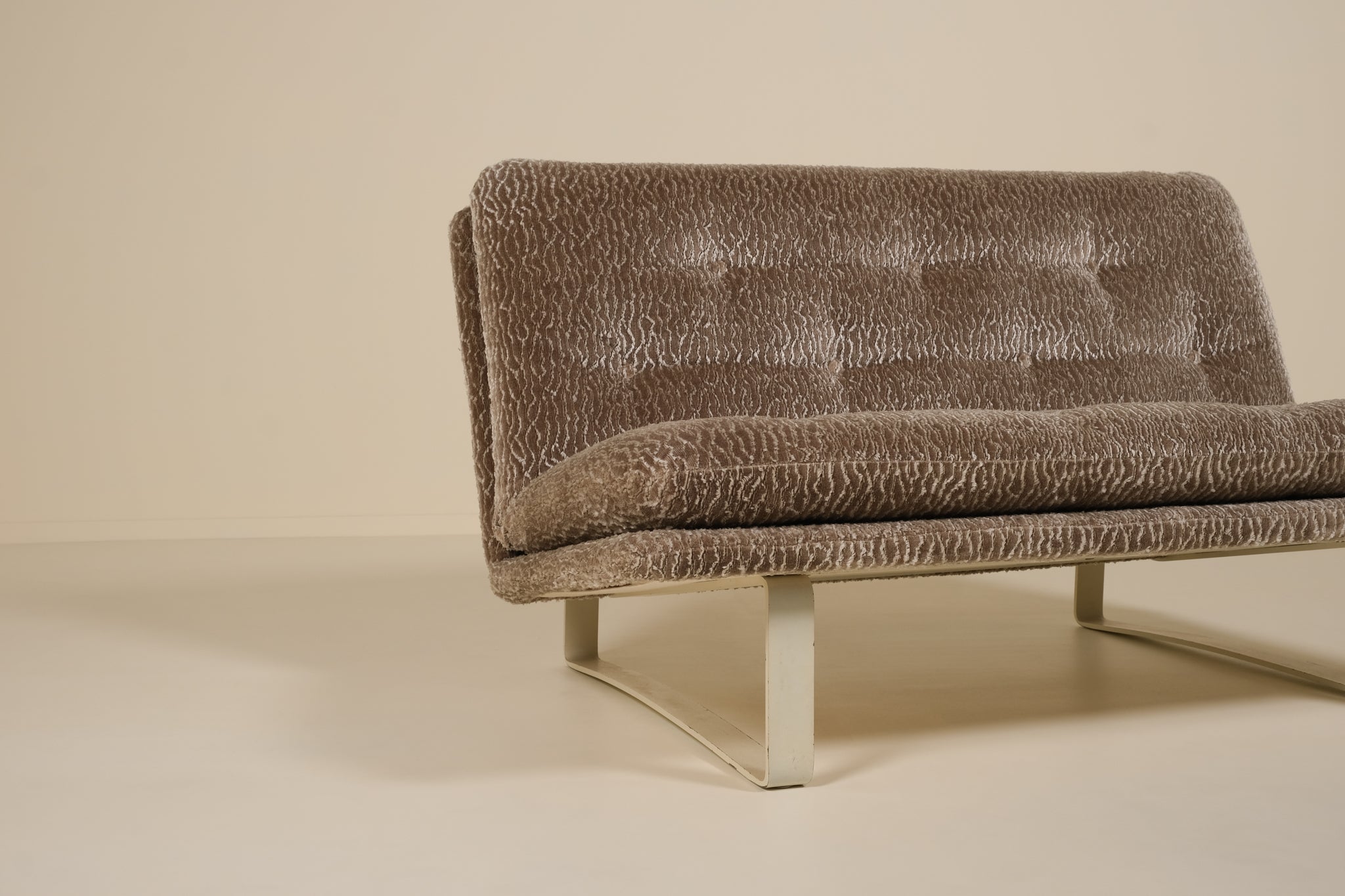 Brown textured sofa on a beige background