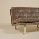 Brown textured sofa on a beige background