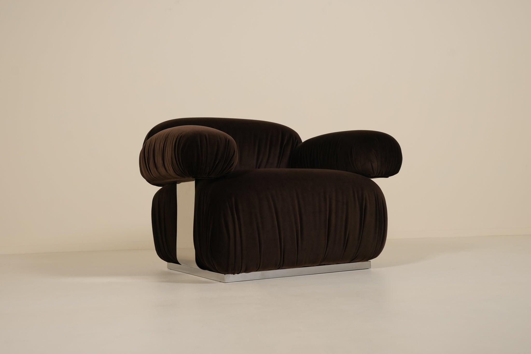 Brown armchair on a beige background