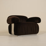 Brown armchair on a beige background