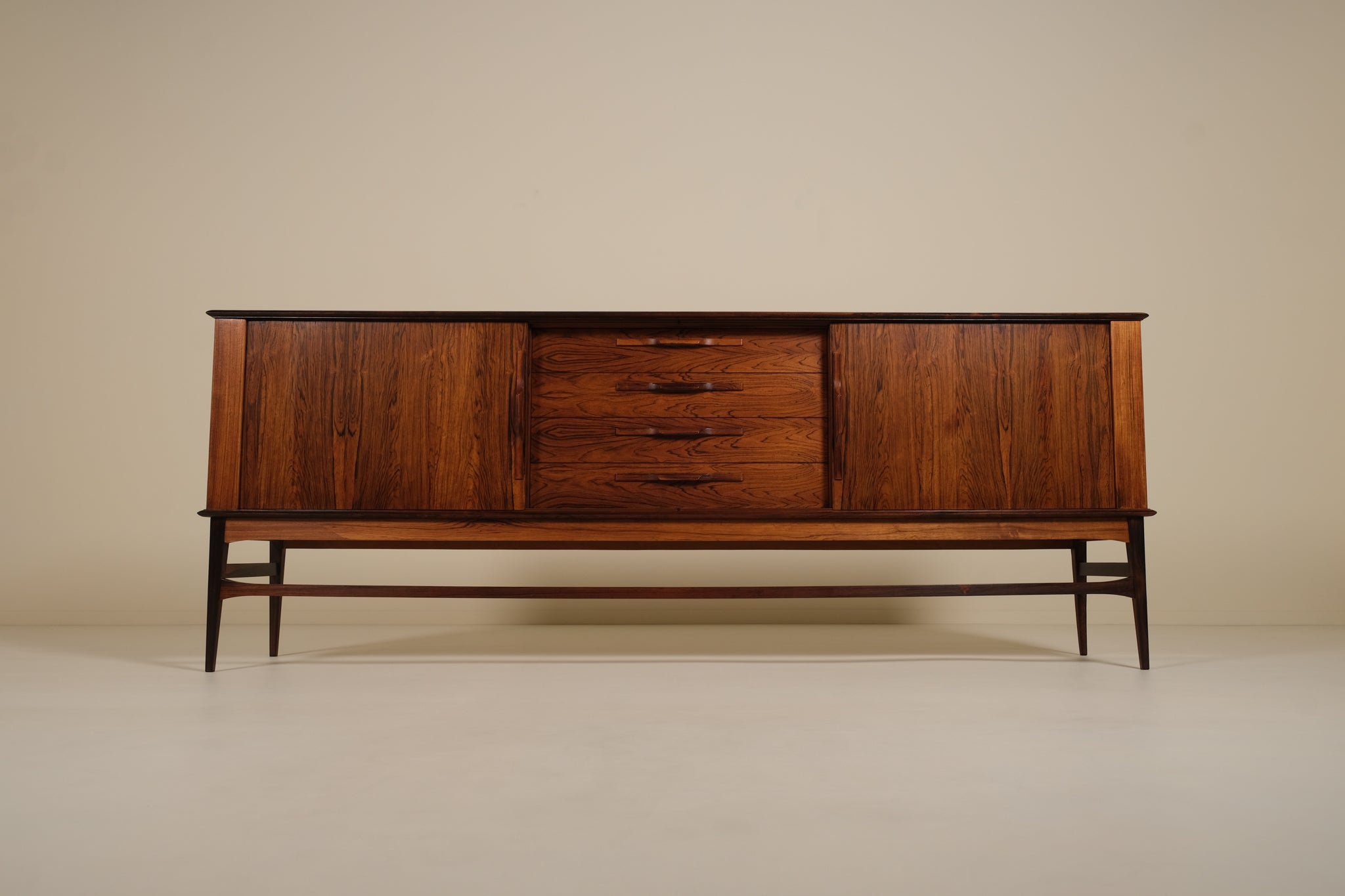 Wooden sideboard with drawers on a beige background