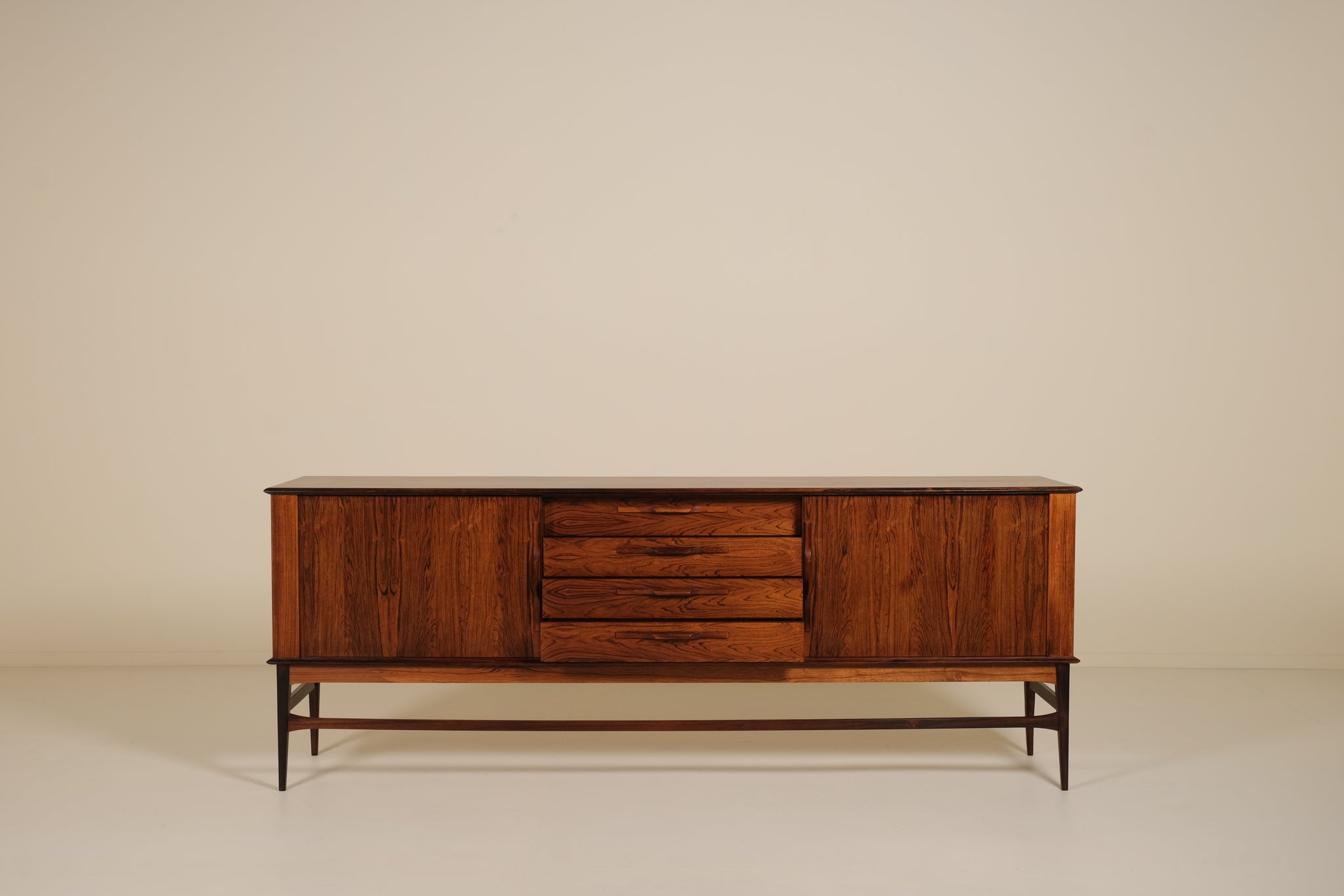 Wooden sideboard with drawers on a beige background