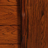 Close-up of a wooden cabinet with a handle