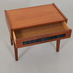 Cabinet with small blue tiles